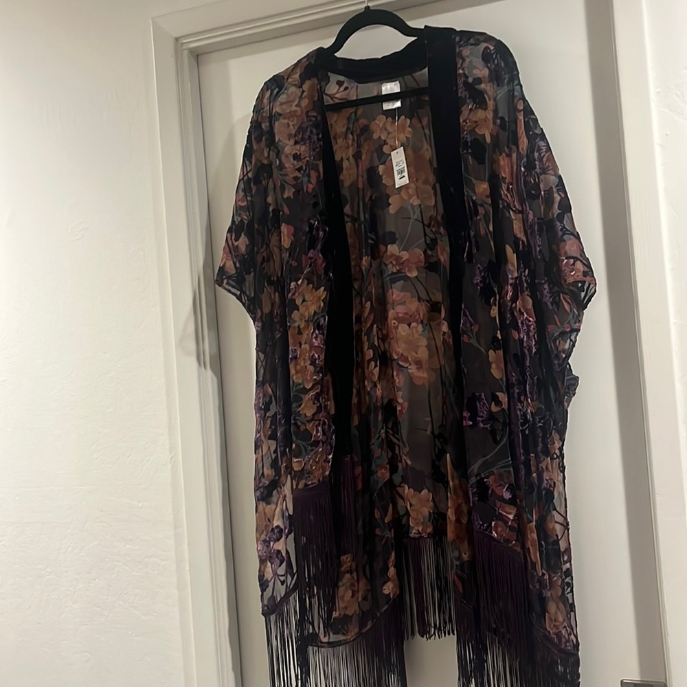 Francesca’s purple kimono with velvet accents and fringe
